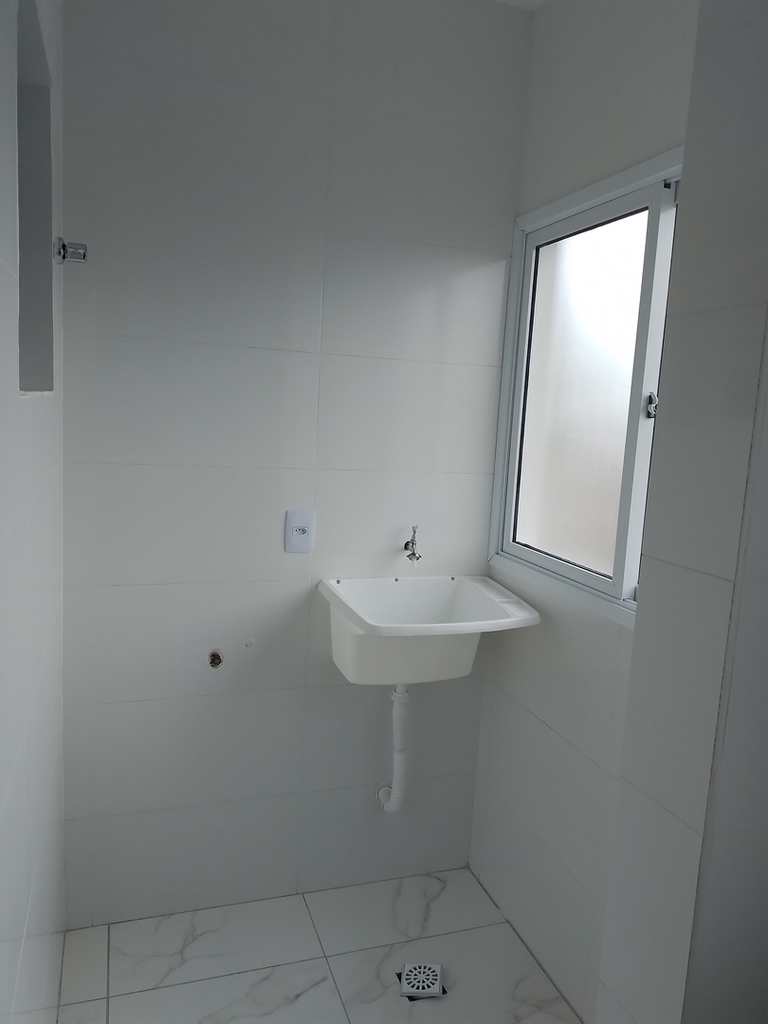 Casa de Condomínio em Praia Grande, no bairro Tude Bastos