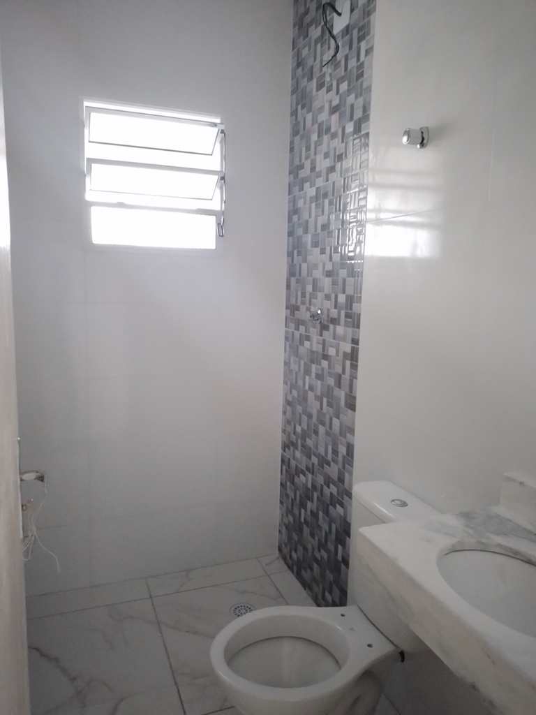 Casa de Condomínio em Praia Grande, no bairro Tude Bastos