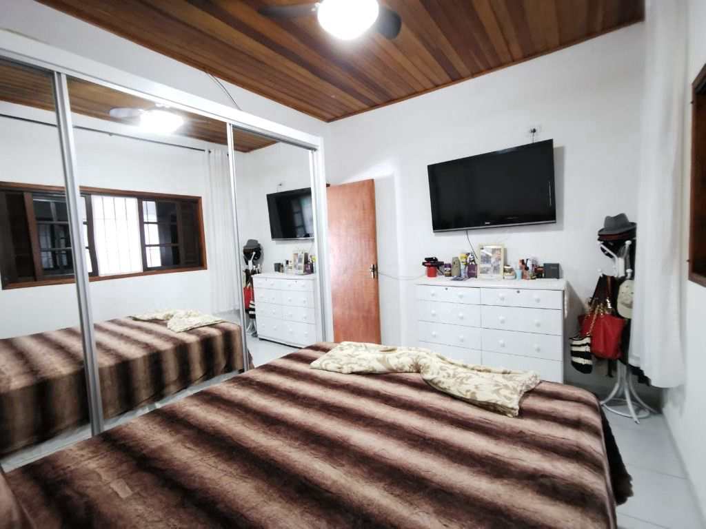 Casa em Praia Grande, no bairro Real