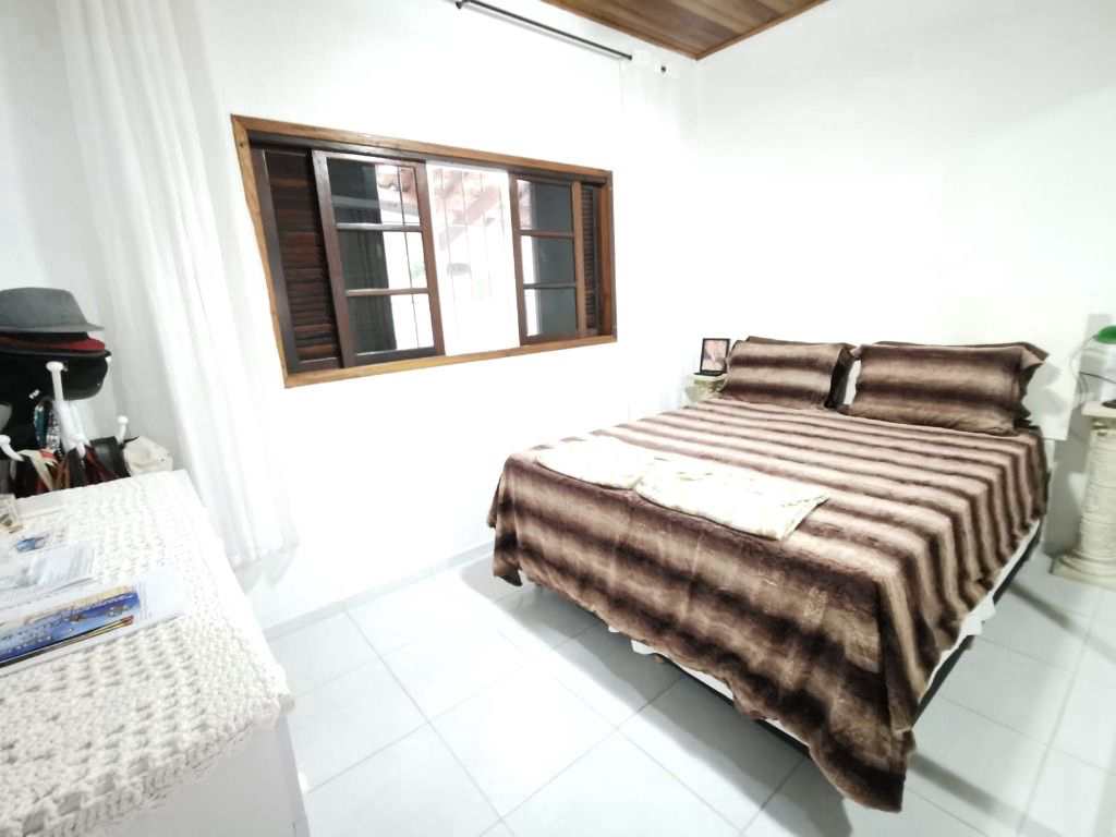 Casa em Praia Grande, no bairro Real