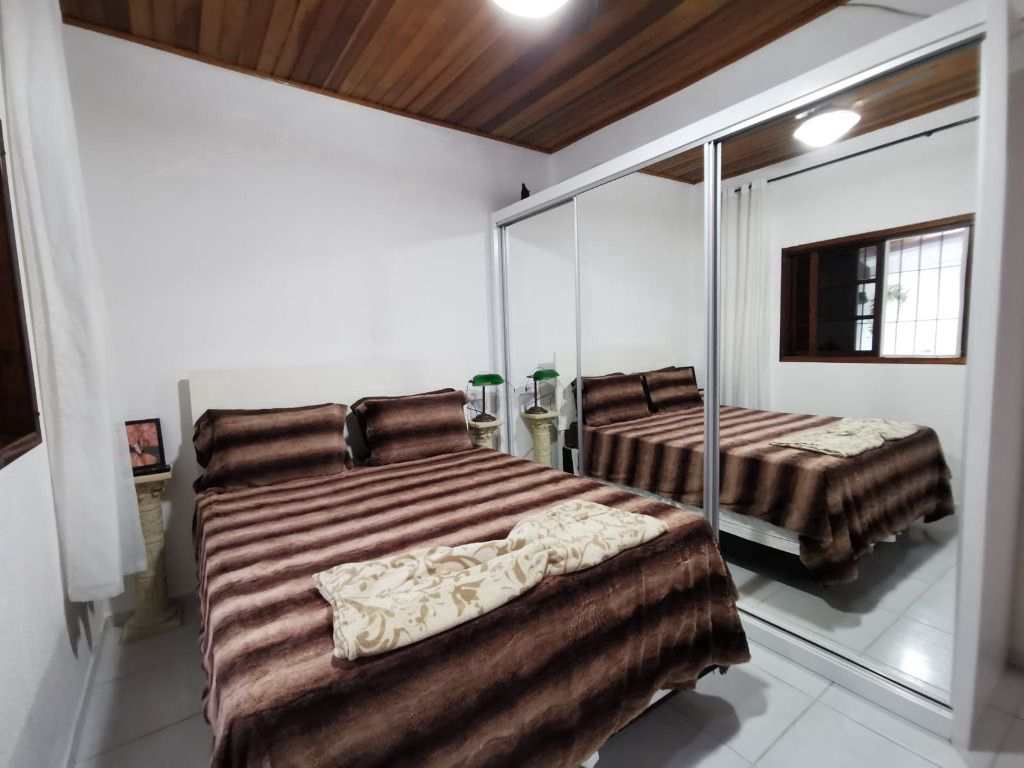 Casa em Praia Grande, no bairro Real