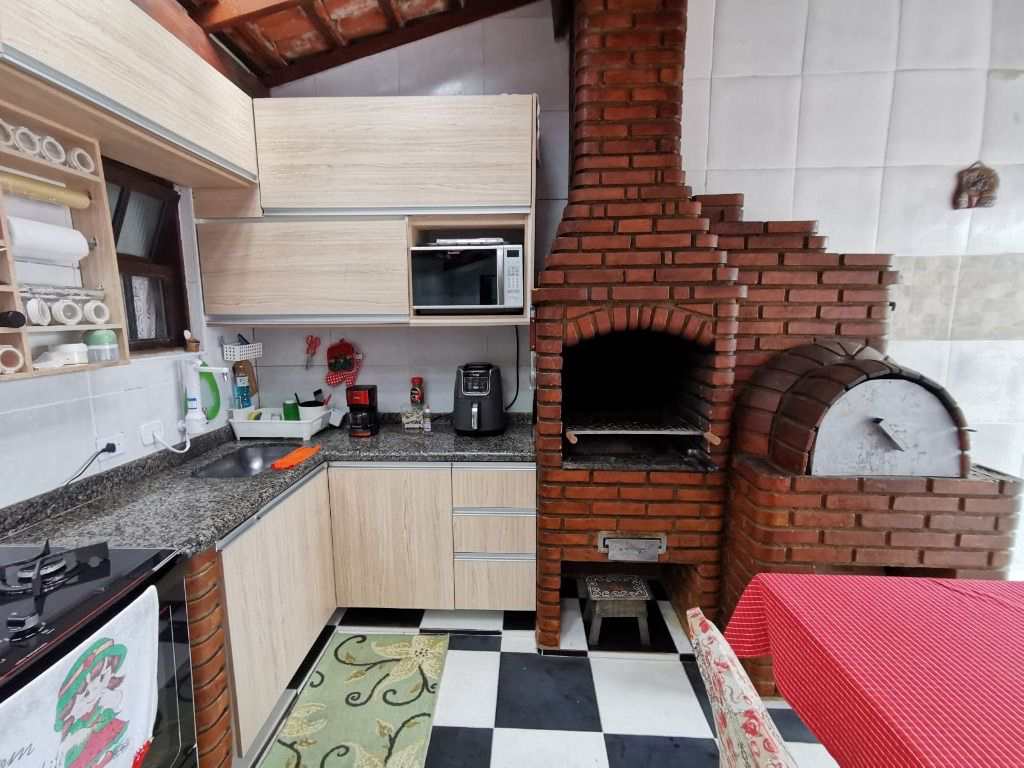 Casa em Praia Grande, no bairro Real