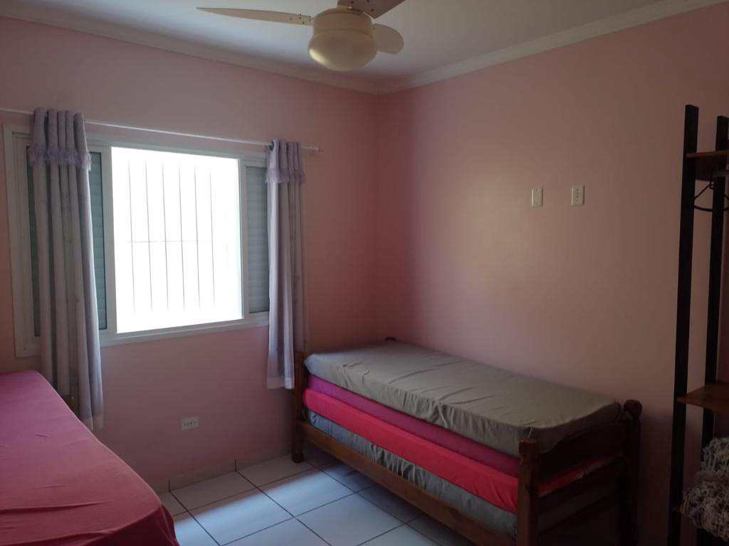 Casa em Praia Grande, no bairro Caiçara