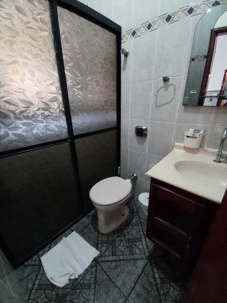 Casa em Praia Grande, no bairro Caiçara