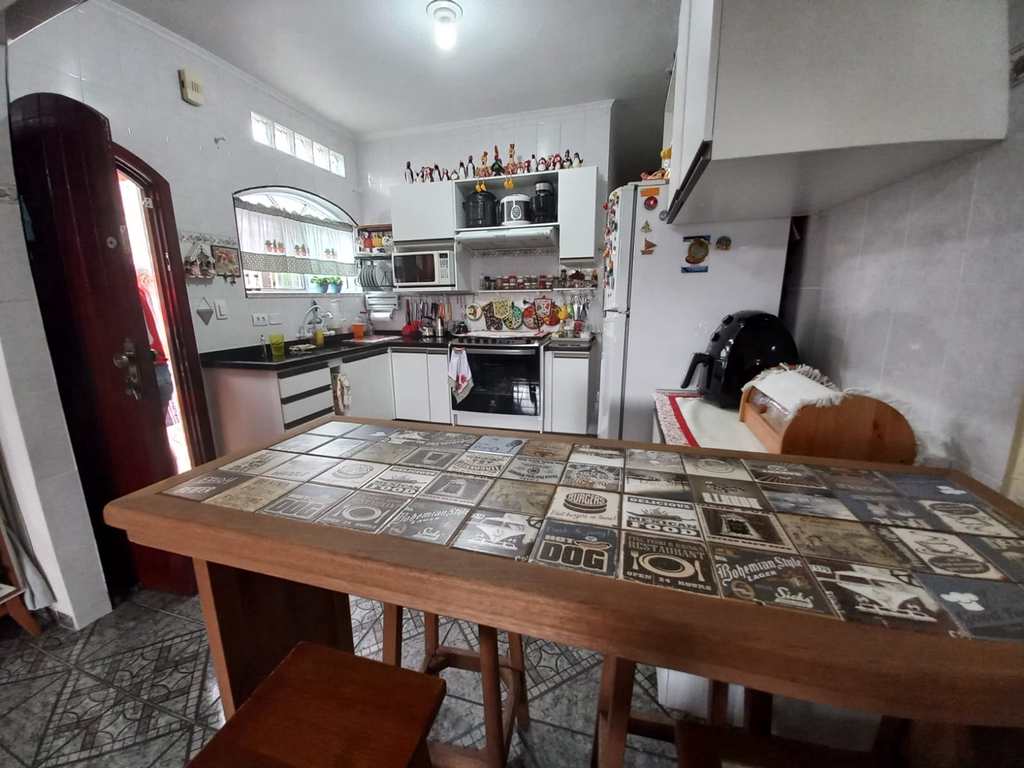 Casa em Praia Grande, no bairro Caiçara