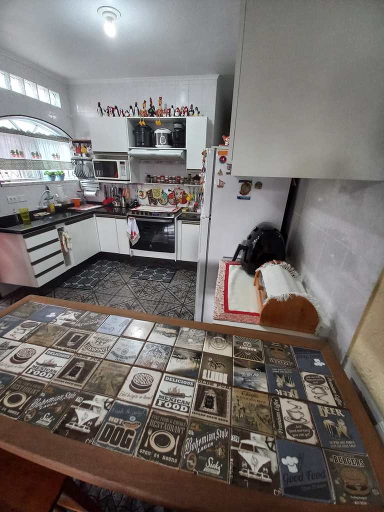 Casa em Praia Grande, no bairro Caiçara