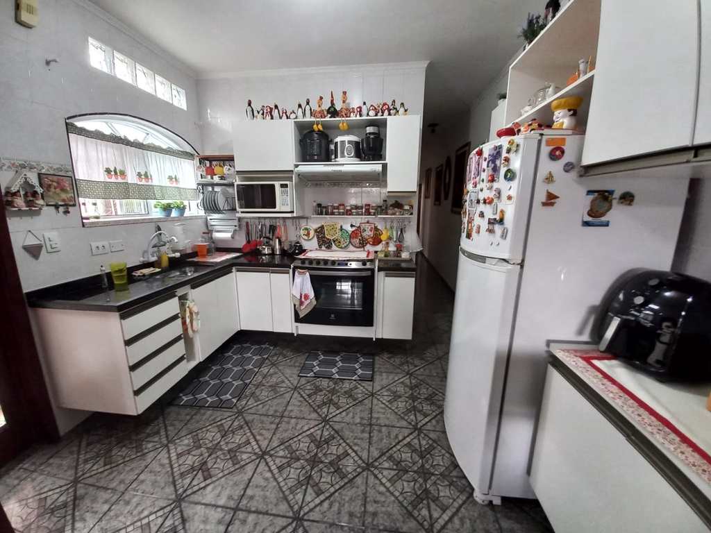 Casa em Praia Grande, no bairro Caiçara