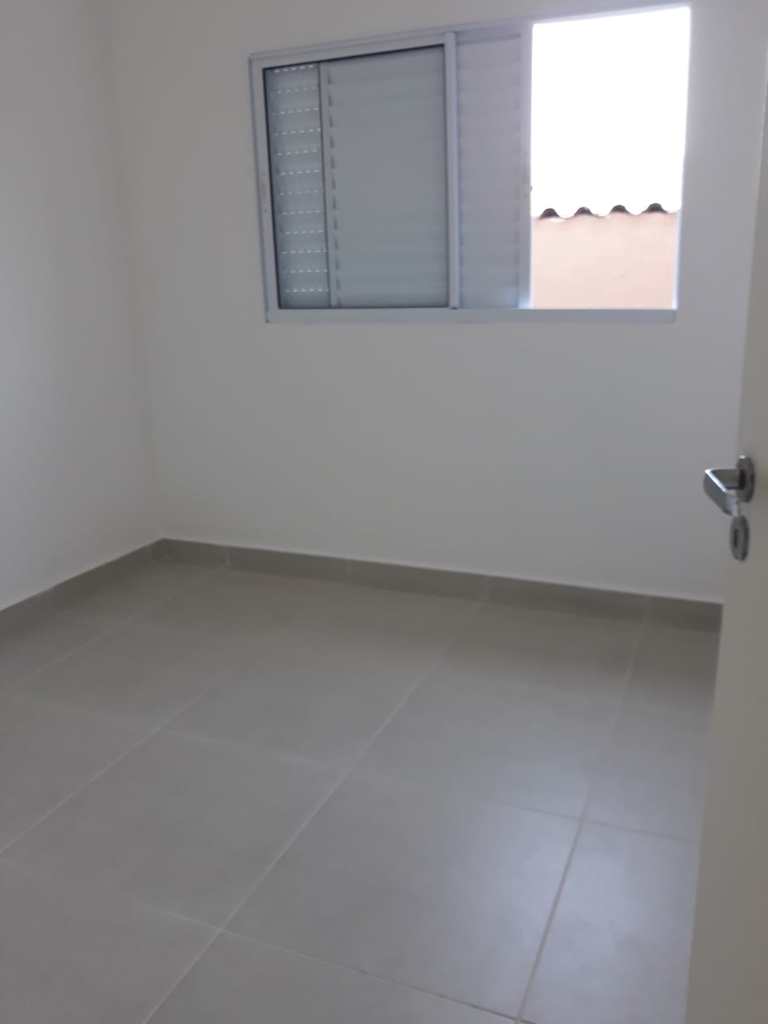 Casa de Condomínio em Praia Grande, no bairro Jardim Melvi