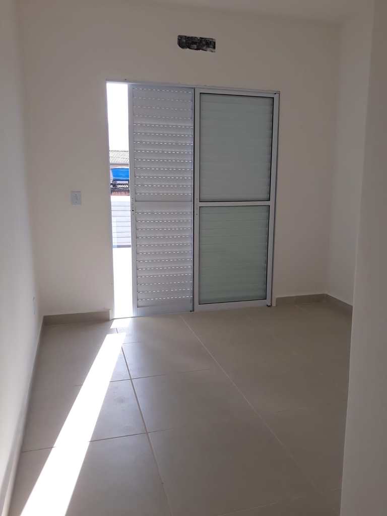Casa de Condomínio em Praia Grande, no bairro Jardim Melvi
