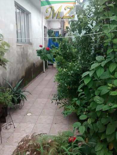 Casa em São Vicente, no bairro Catiapoa