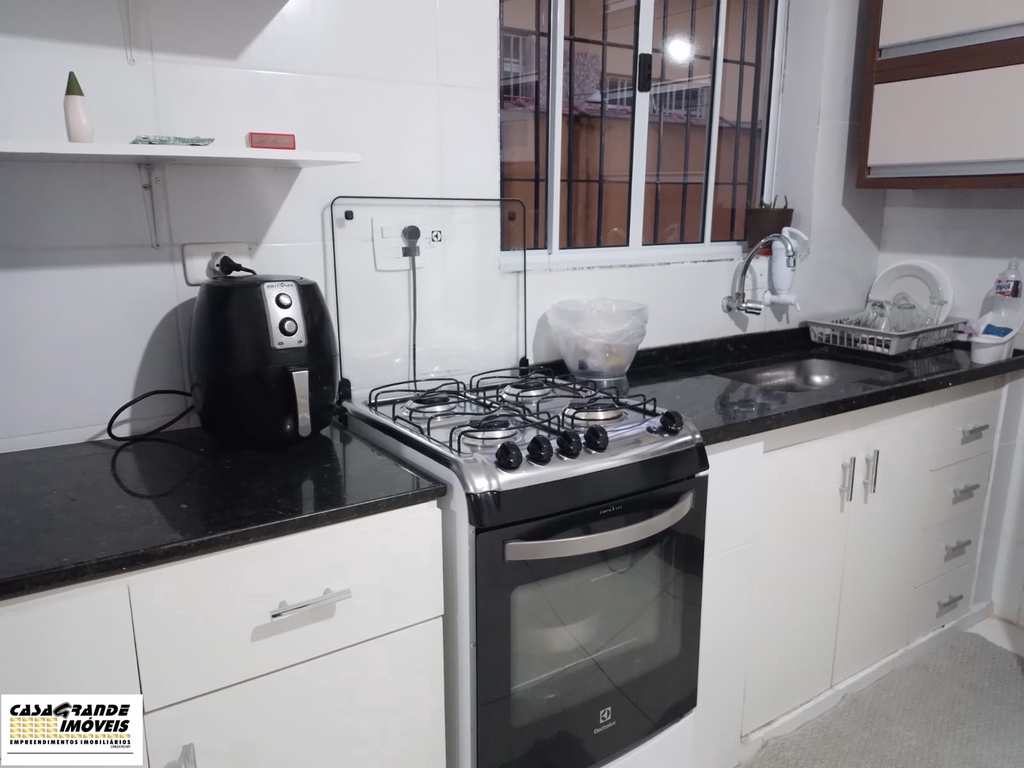 Casa em Praia Grande, no bairro Real
