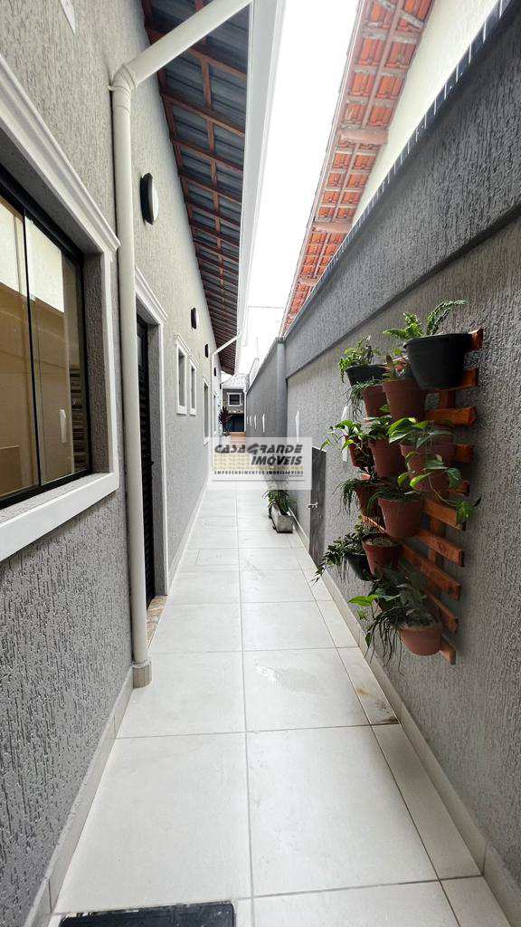 Casa em Praia Grande, no bairro Caiçara