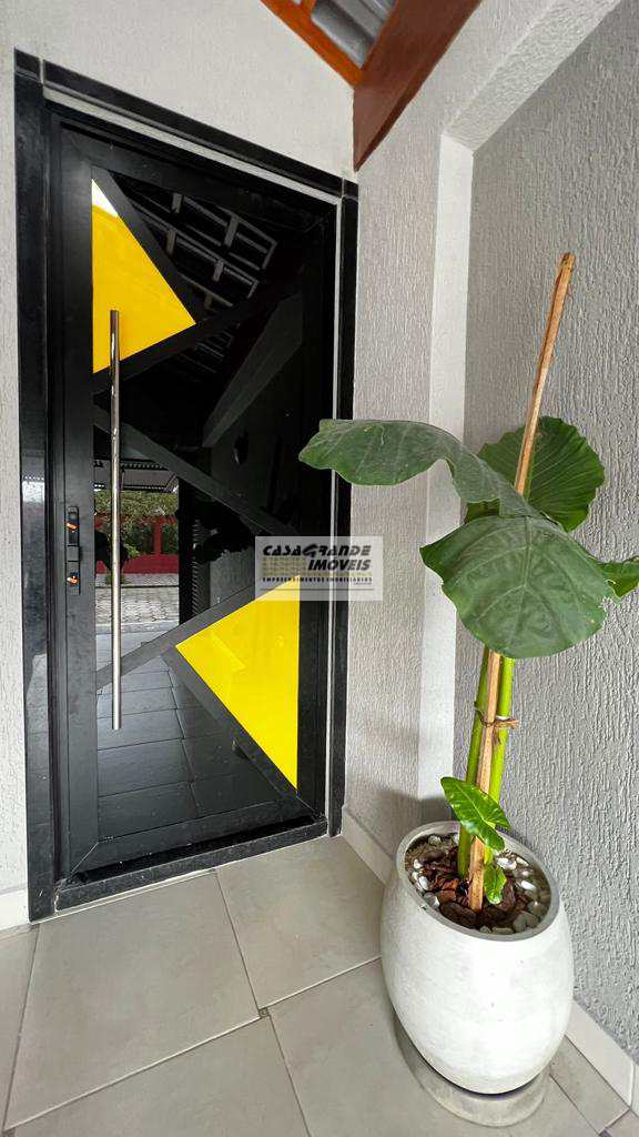 Casa em Praia Grande, no bairro Caiçara