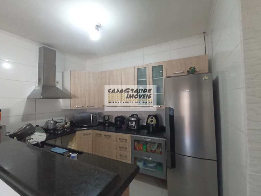 Casa em Praia Grande, no bairro Real