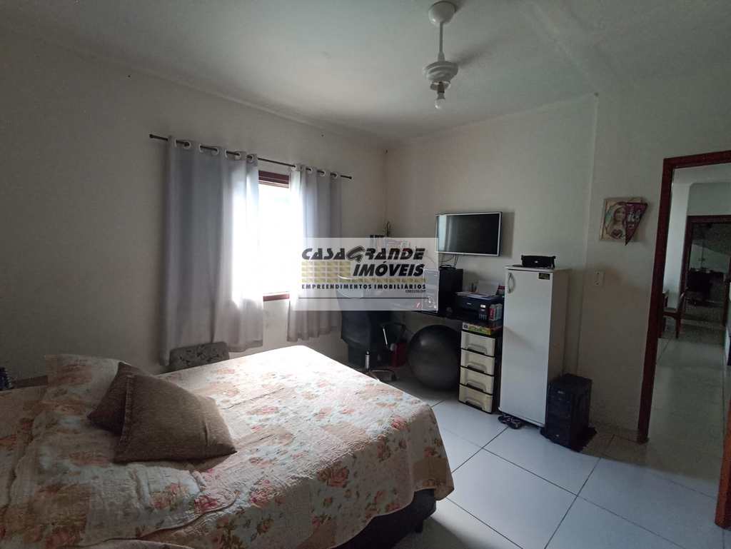 Casa em Praia Grande, no bairro Real