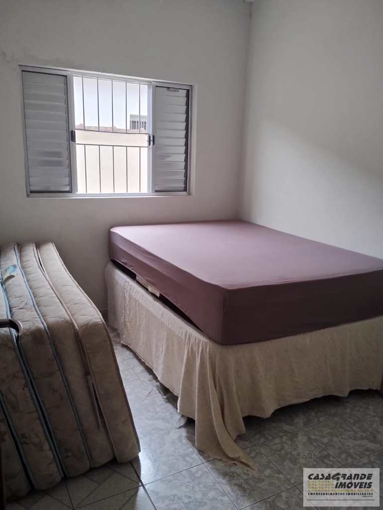 Casa em Praia Grande, no bairro Caiçara