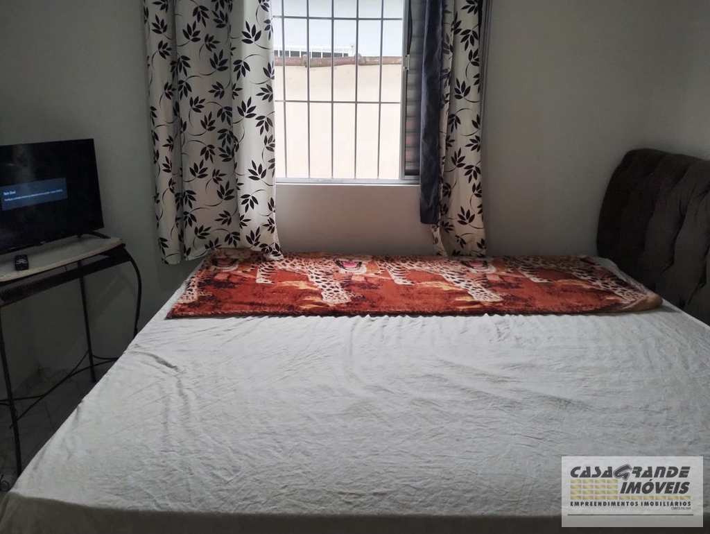 Casa em Praia Grande, no bairro Caiçara