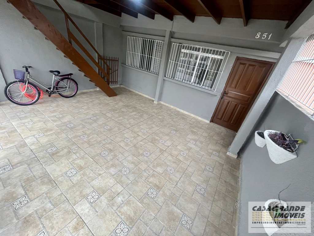 Casa em Praia Grande, no bairro Caiçara