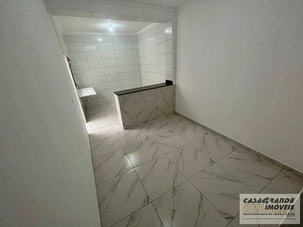 Casa em Praia Grande, no bairro Caiçara