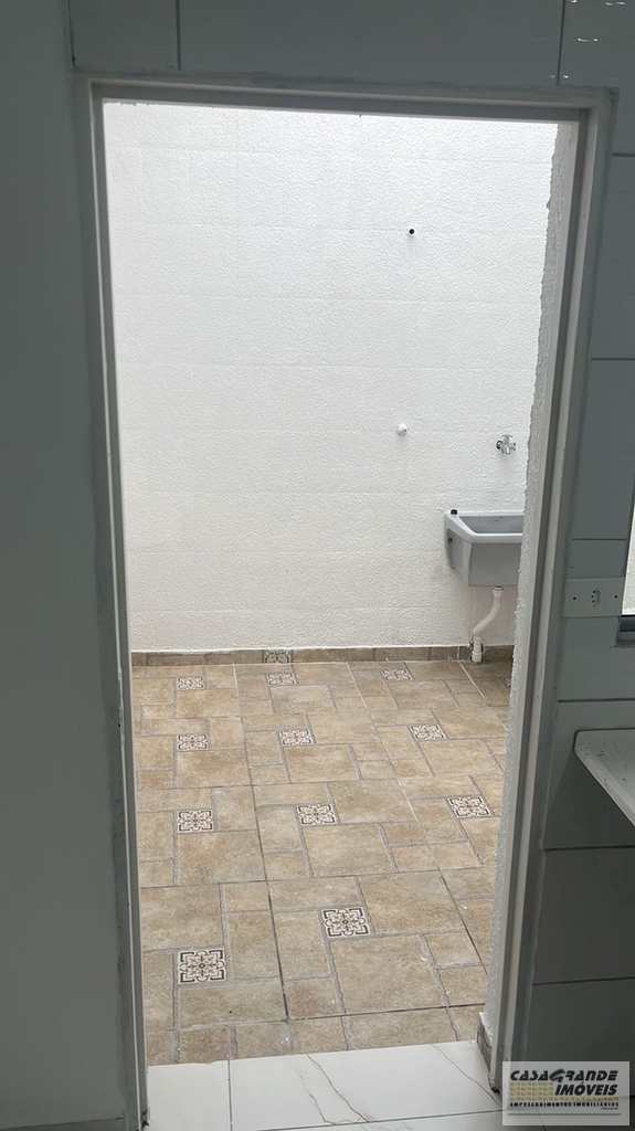 Casa em Praia Grande, no bairro Caiçara