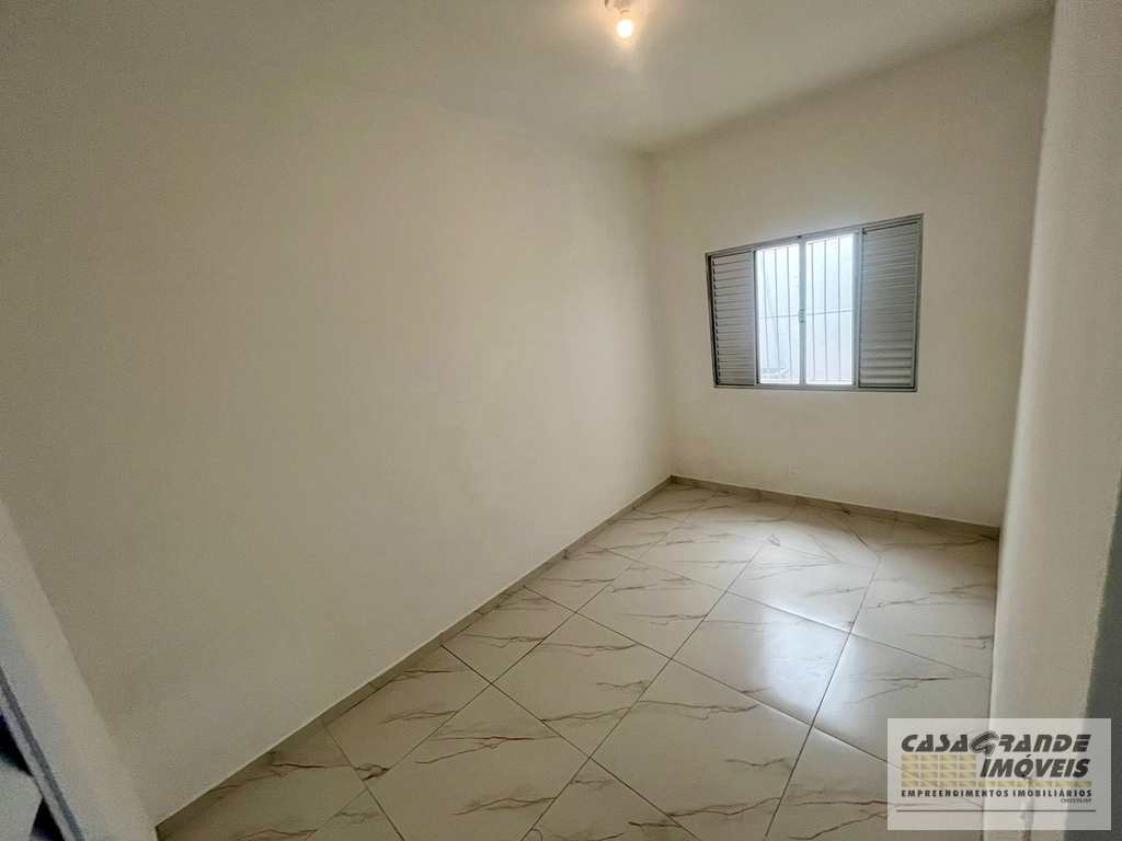 Casa em Praia Grande, no bairro Caiçara