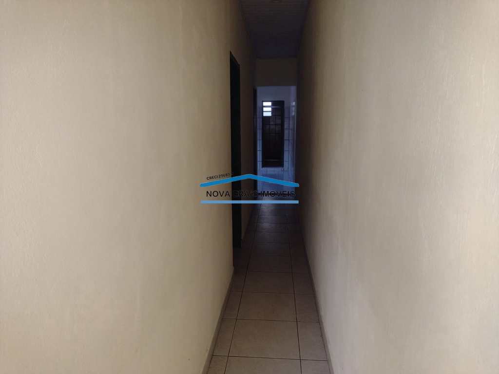 Casa em São Vicente, no bairro Japuí