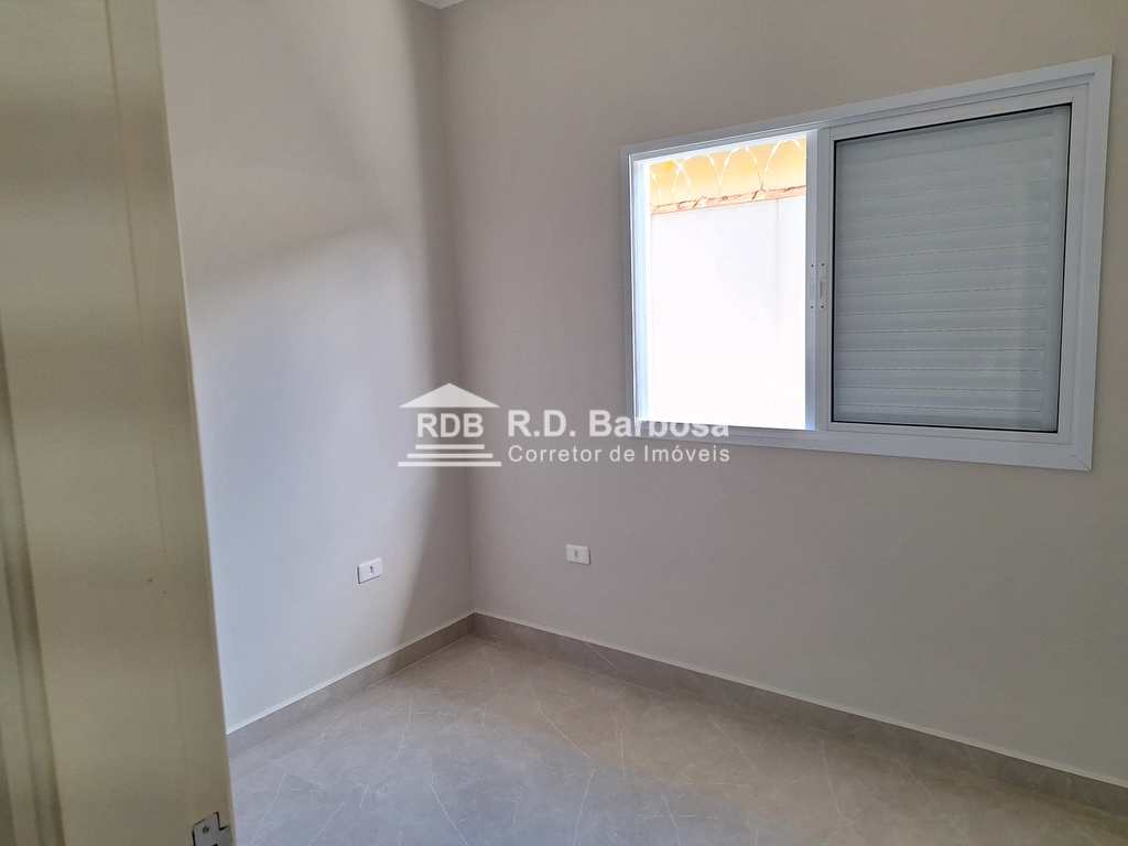 Casa em Praia Grande, no bairro Real