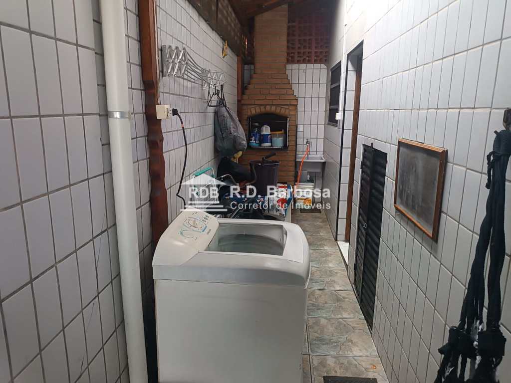 Sobrado em Praia Grande, no bairro Caiçara