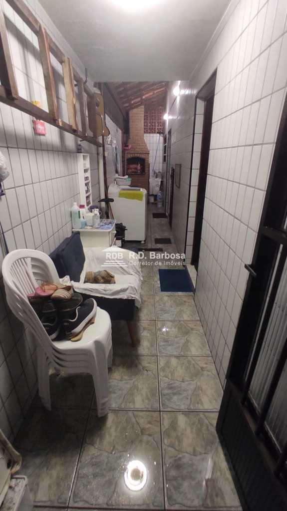 Sobrado em Praia Grande, no bairro Caiçara