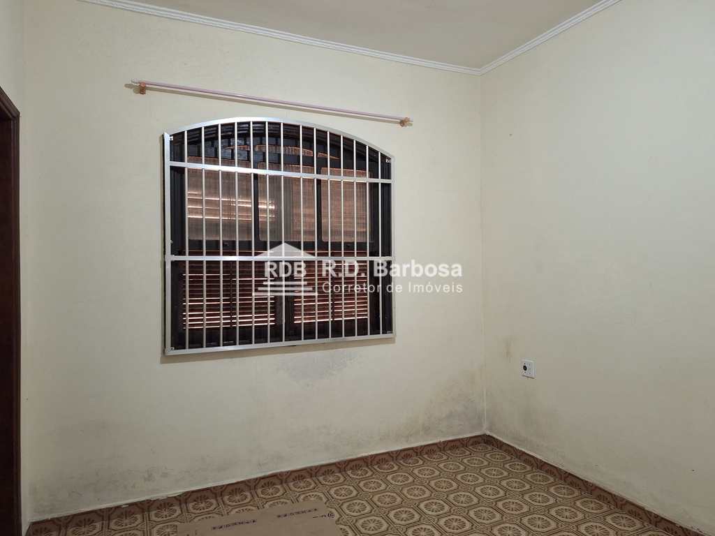 Casa em Praia Grande, no bairro Caiçara