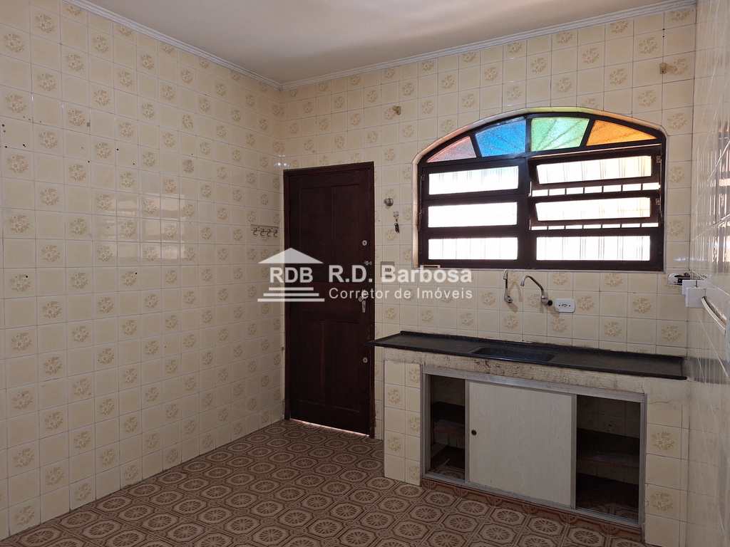 Casa em Praia Grande, no bairro Caiçara