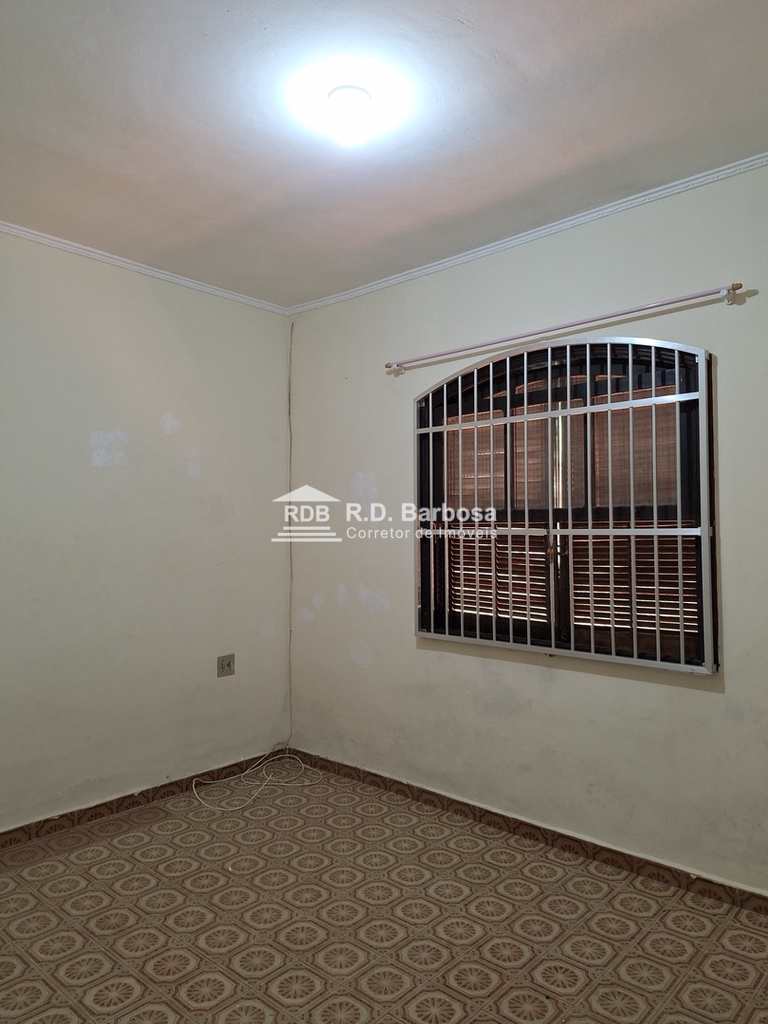 Casa em Praia Grande, no bairro Caiçara