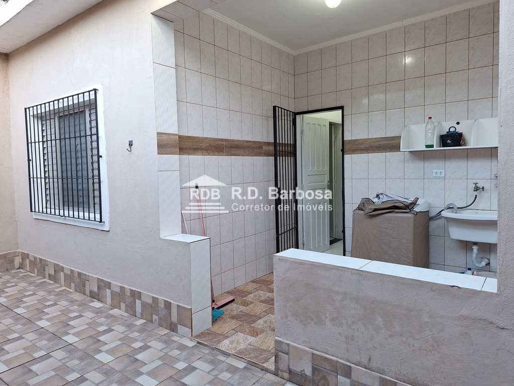 Casa em Praia Grande, no bairro Caiçara