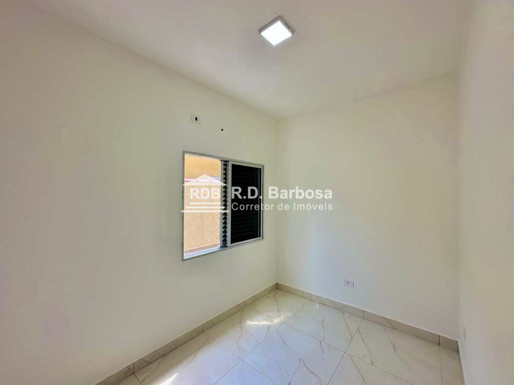 Casa em Praia Grande, no bairro Caiçara