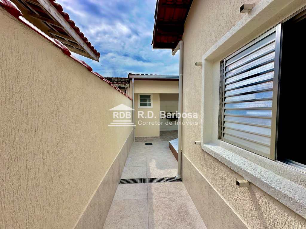 Casa em Praia Grande, no bairro Caiçara