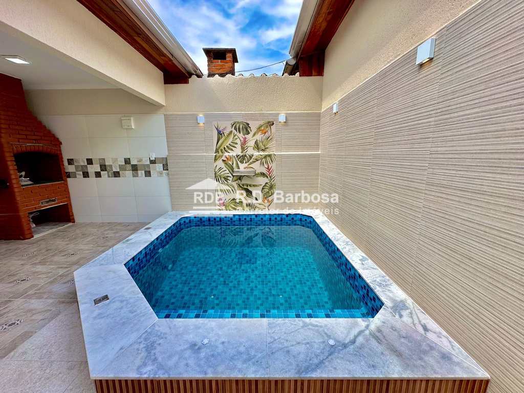 Casa em Praia Grande, no bairro Caiçara