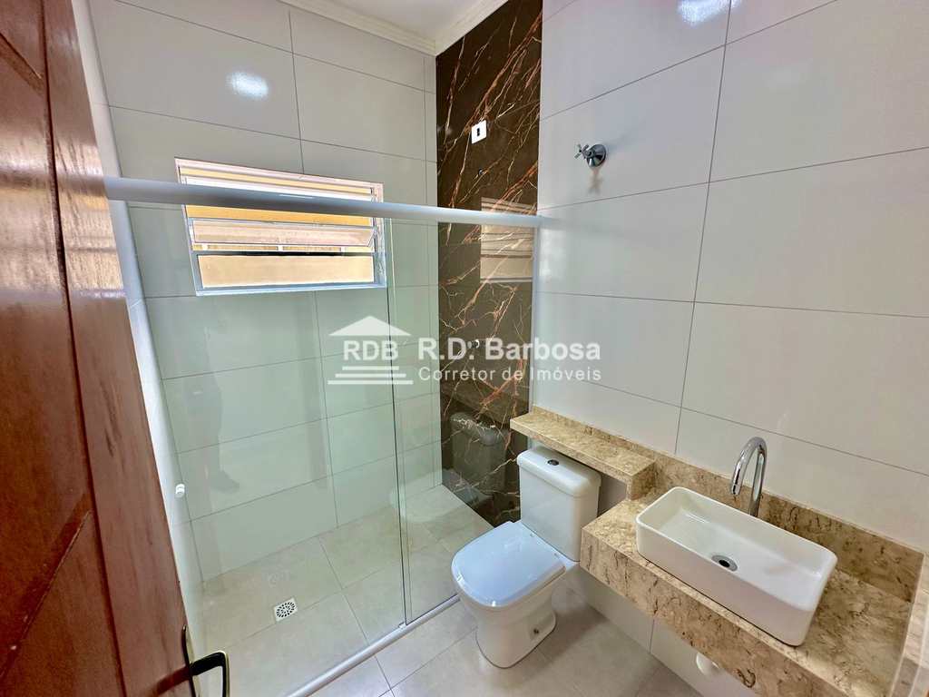 Casa em Praia Grande, no bairro Caiçara