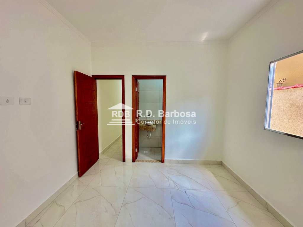 Casa em Praia Grande, no bairro Caiçara