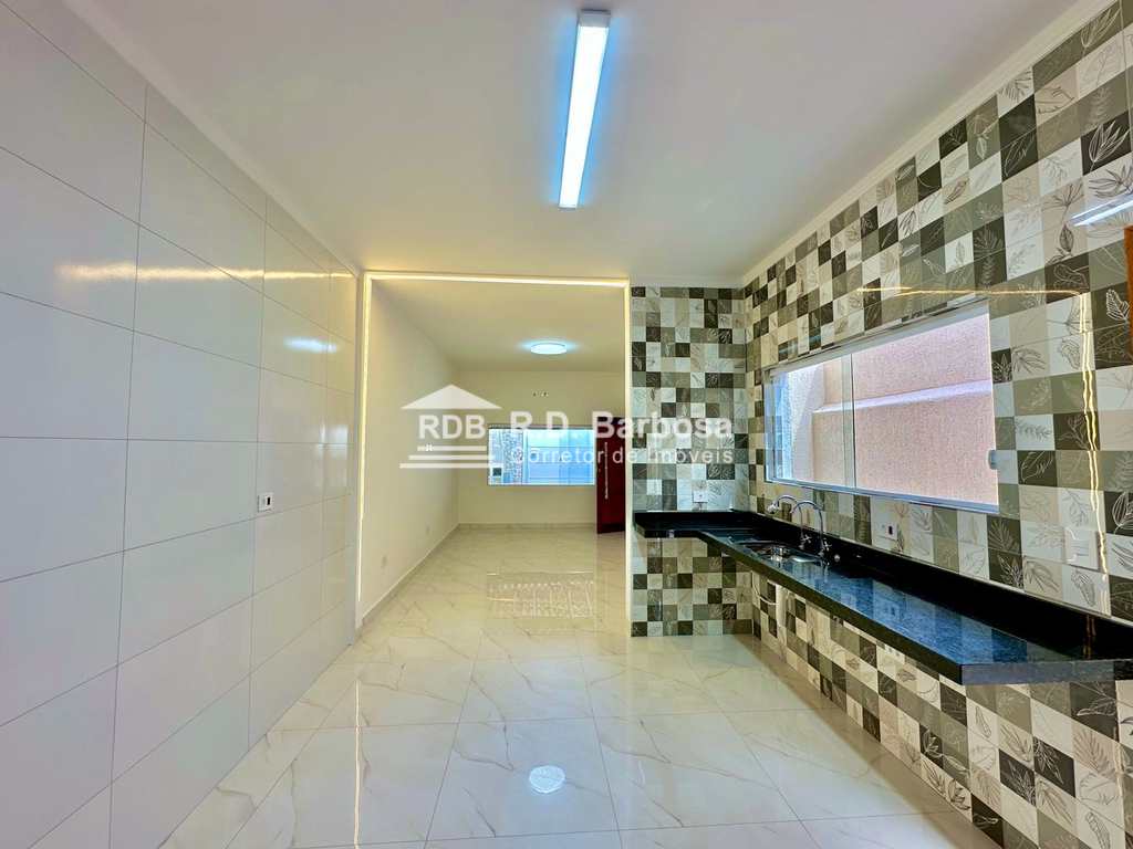 Casa em Praia Grande, no bairro Caiçara