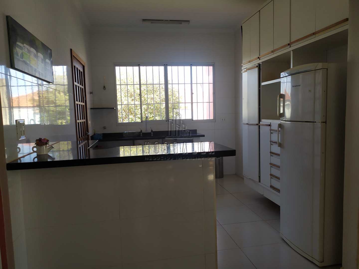 Casa à venda com 4 quartos, 187m² - Foto 1