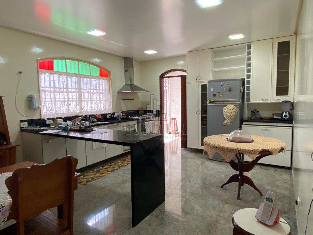 Casa à venda com 4 quartos, 310m² - Foto 11