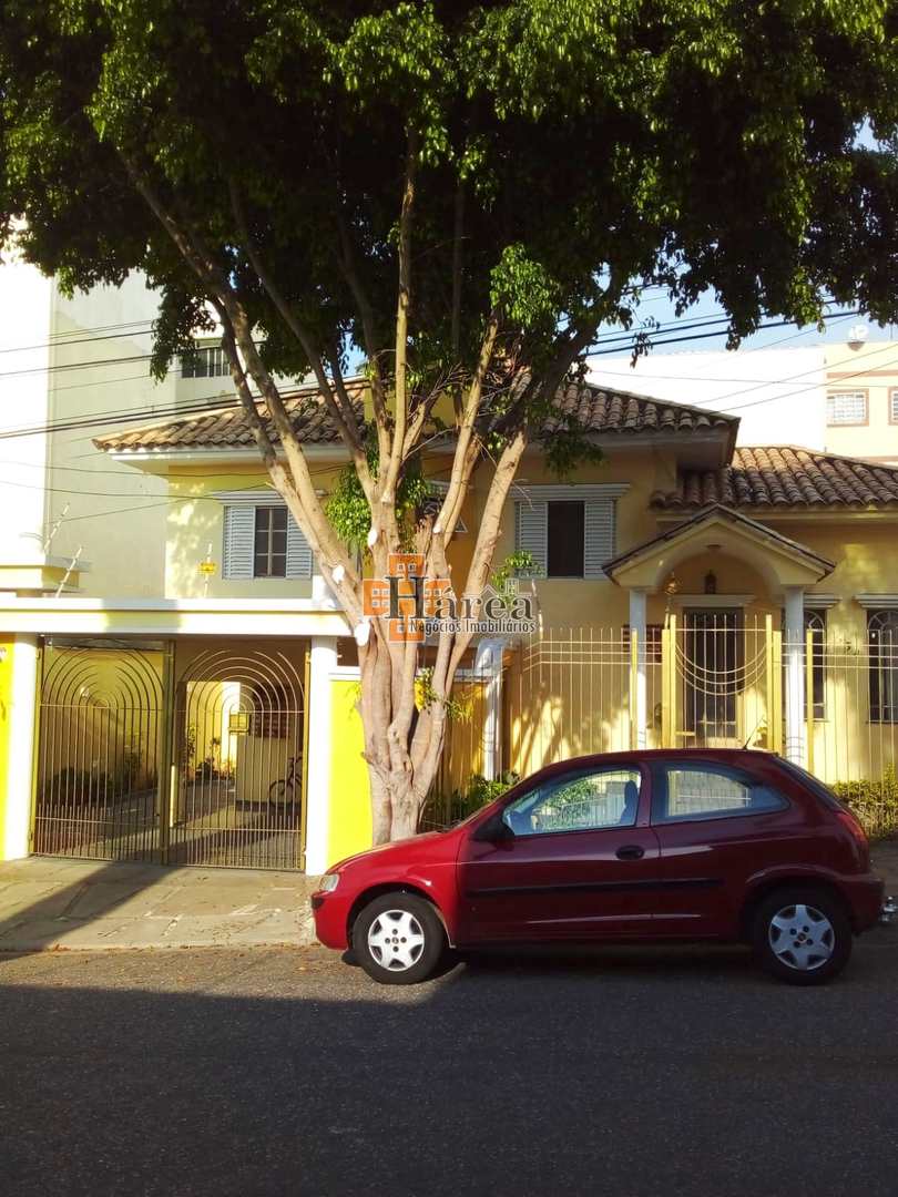 Casa à venda com 3 quartos, 118m² - Foto 1