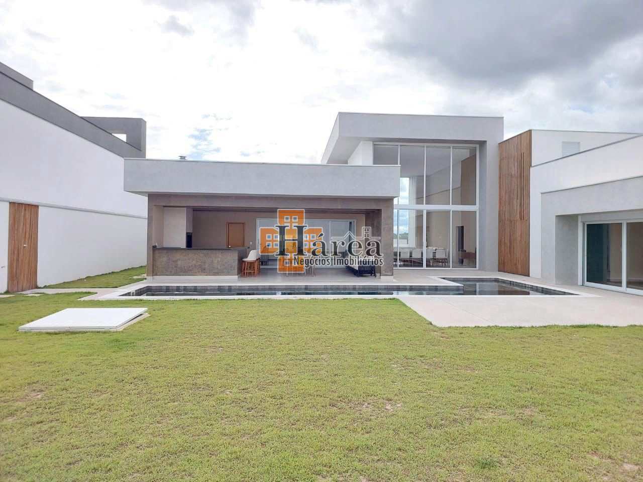 Casa de Condomínio à venda e aluguel com 4 quartos, 394m² - Foto 1