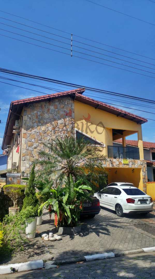 Casa em Condomínio Fechado de alto padrão - Centro - Bertioga.